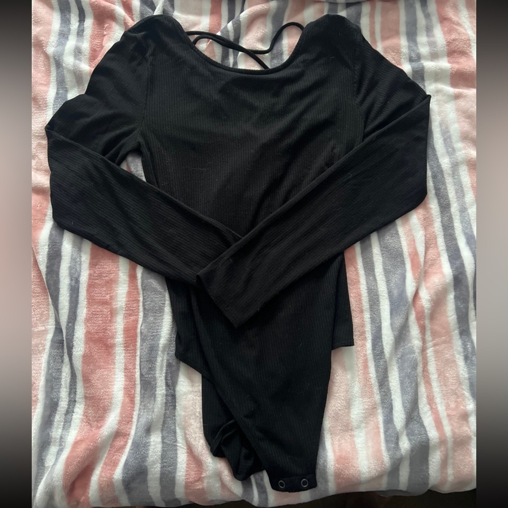 Body suit with the back open